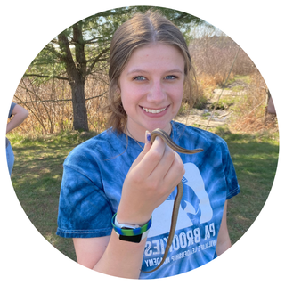 Elizabeth Bruner holding a snake